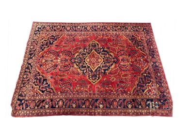 A Hamadan Carpet, the blood red field of flowering plants ce...