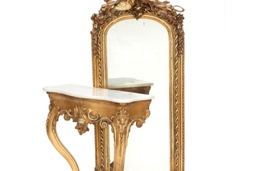 A Neo-Rococo giltwood mirror with accompanying cosole with marble top. Ca. 1860. H. 232 cm. W. 65 cm. D. 32 cm.