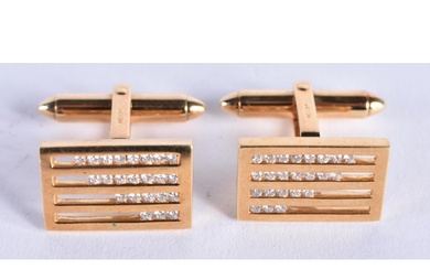A PAIR OF 18CT GOLD AND DIAMOND CUFFLINKS. 10.9 grams. 1.75 ...