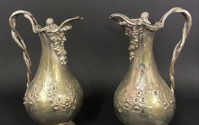 A PAIR OF 19TH C. SILVER PLATED CLARET JUGS