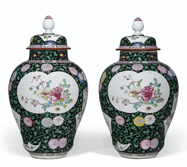 A PAIR OF BLACK-GROUND FAMILLE ROSE VASES