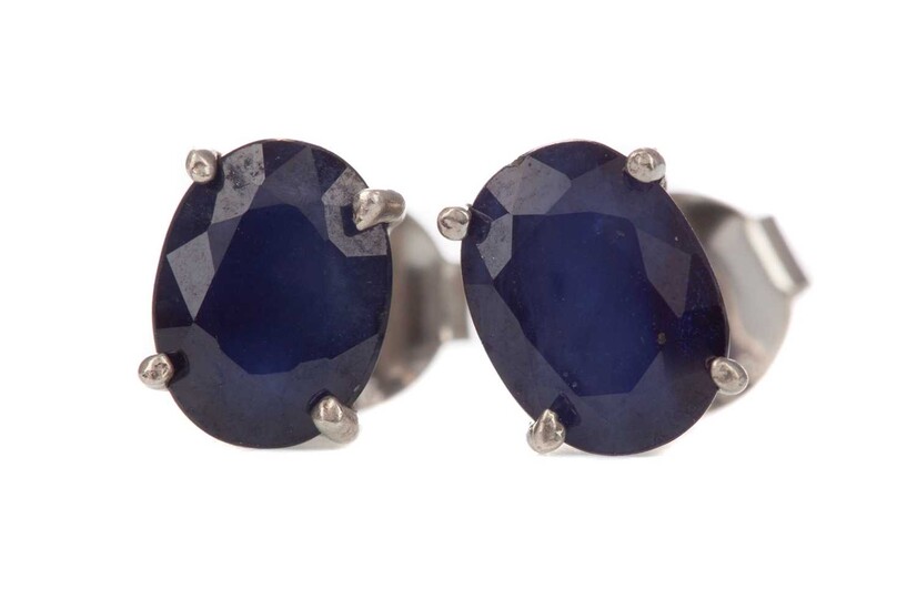 A PAIR OF TREATED SAPPHIRE STUD EARRINGS