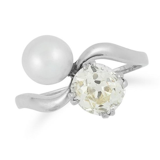 A PEARL AND DIAMOND TOI ET MOI RING set with a pearl