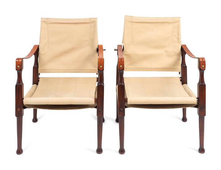 A Pair of British Colonial Style Mahogany, Canvas and Leather Strap Campaign Chairs