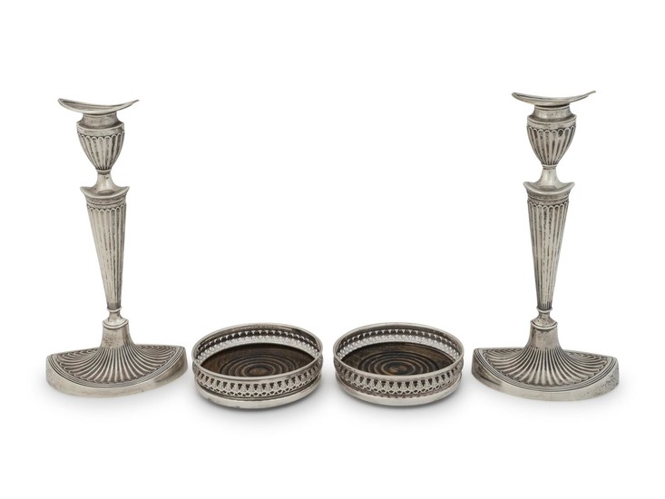 A Pair of English Silver Candlesticks and a Pair of English Silver Coasters