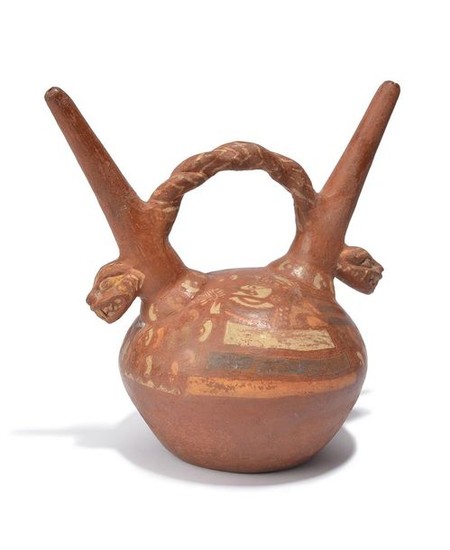 A Peru double spouted stirrup vessel terracotta, with...