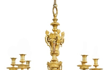 A Regence gilt-bronze chandelier, after a design by André-Charles Boulle | Lustre en bronze doré de style Régence, d'après un modèle d'André-Charles Boulle