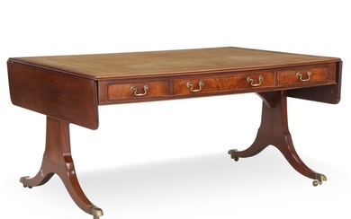 A Regency style mahogany desk with leather top. England, last half of the 20th century. H. 75 cm. W. 155/205 cm. D. 110 cm.