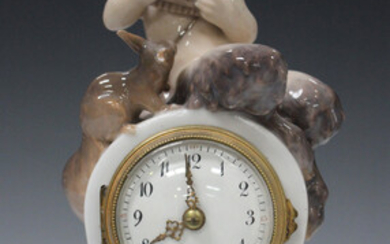 A Royal Copenhagen timepiece, post-1918, designed by Christian Thomson, the white enamel dial with b