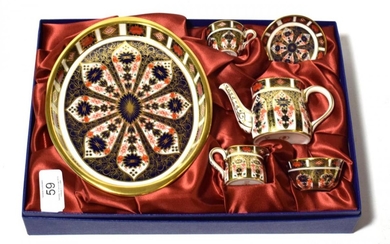 A Royal Crown Derby Imari pattern miniature cabaret set including:...