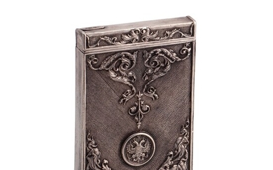 A Russian presentation silver-gilt cigarette case. Kiev, 1908-1917. Dimensions: 10.5 x 7 cm. Weight: 148...