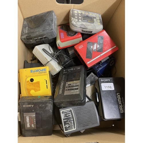 A Sony walkman cassette player, and various other walkman (b...