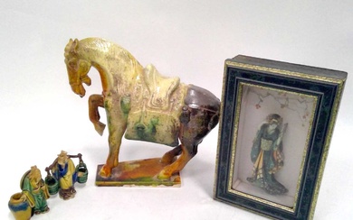 A Tang Dynasty-style, glazed terracotta horse 24cm in height together...