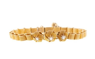 A Textured Link Bracelet with Seed Pearls in 18K