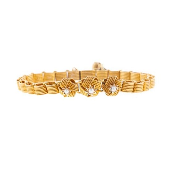 A Textured Link Bracelet with Seed Pearls in 18K