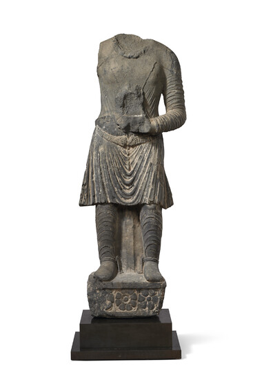 A VERY RARE AND MONUMENTAL GREY SCHIST FIGURE OF A DONOR ANCIENT REGION OF GANDHARA, PROBABLY 4TH CENTURY CE