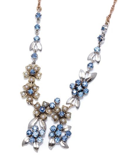 A VINTAGE 9CT TRICOLOUR GOLD SAPPHIRE AND PEARL NECKLACE; floral clusters of round cut fine blue sapphires and seed pearls in yellow...