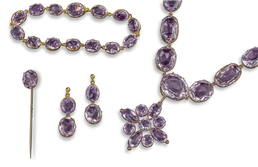 A Victorian amethyst rivière necklace, set with graduated...
