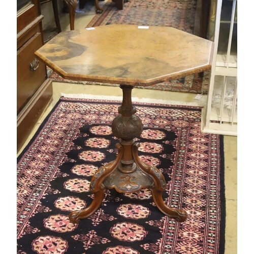 A Victorian burr walnut octagonal topped tea table, raised o...