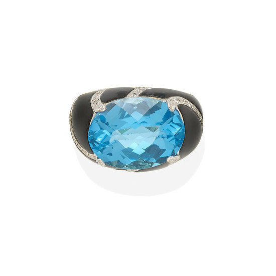 A blue topaz, diamond and onyx ring