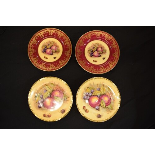 A collection of Aynsley Orchard Gold plates with D Jones sig...