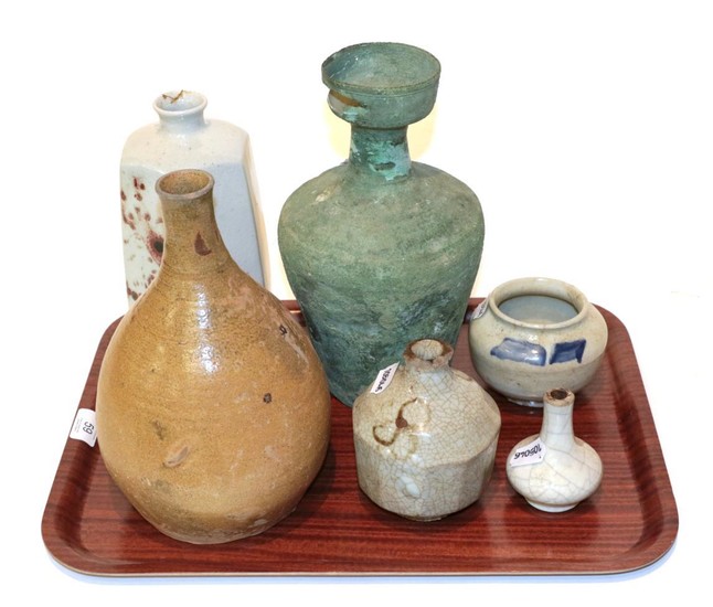 A collection of Korean ceramics and a bronze, some 18th/19th...
