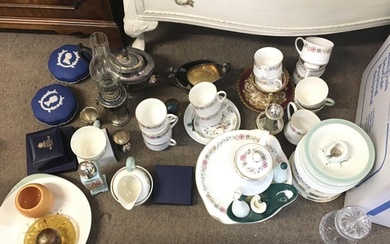 A collection of mixed ceramics and silver plate ware. Includ...