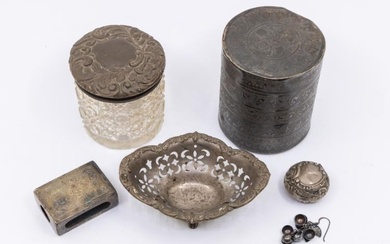A collection of silver and white metal items to include;...