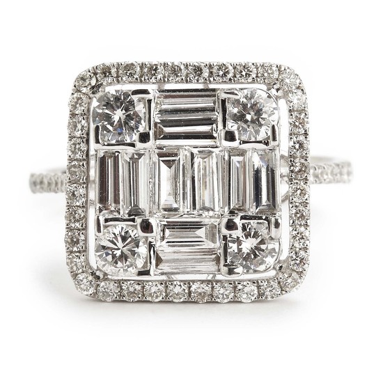 A diamond ring set with numerous baguette and brilliant-cut diamonds weighing a total of app. 1.44 ct., mounted in 18k white gold. H/VS-P1. Size 53.