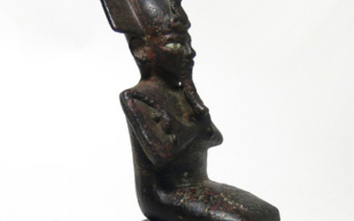 A fantastic Egyptian bronze figure of seated Osiris