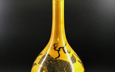 A fine Chinese yellow ground with black ink painted...