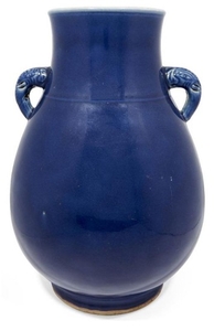 A large Chinese monochrome porcelain vase, hu,...