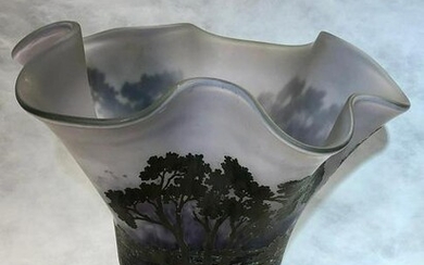 A large handblown art glass vase w/ copper overlay