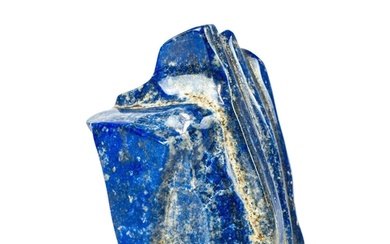 A large lapis lazuli mineral specimen. A free standing, poli...