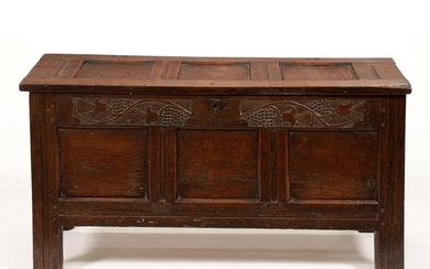 A late 17th or early 18th c panelled oak blanket box, the fr...