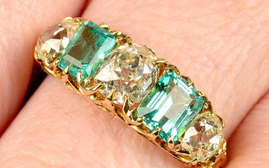 A late 19th century gold alternating graduated old-cut diamond and emerald five-stone ring.