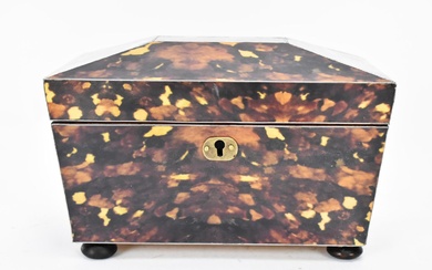 A late 20th century tortoiseshell twin compartment tea caddy,...