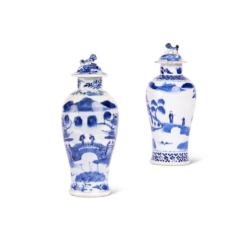 A matched pair of Chinese-Export blue and white baluster vas...