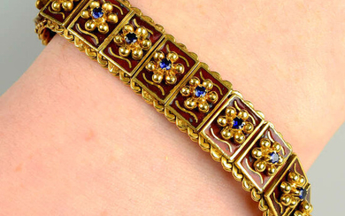 A mid 20th century 18ct gold brown enamel and sapphire floral bracelet.