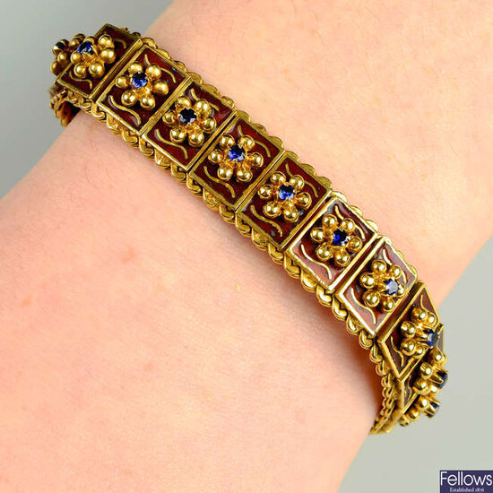A mid 20th century 18ct gold brown enamel and sapphire floral bracelet.