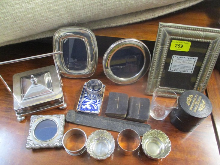 A mixed lot to include silver photo frames, two miniature bi...