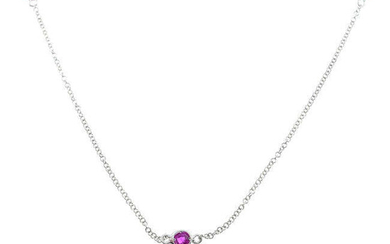 A necklace, with ruby spacers.