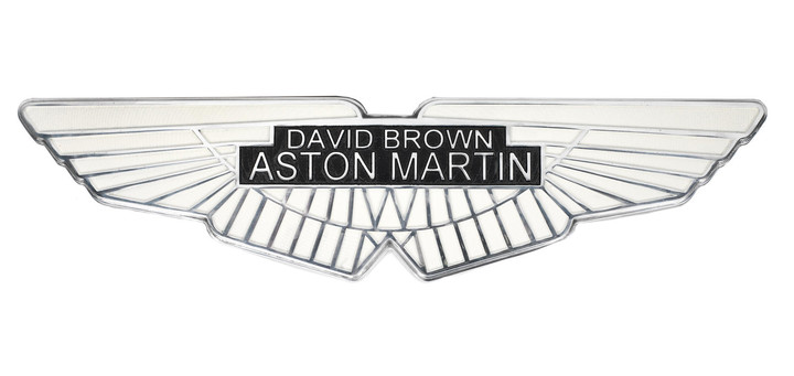 A painted cast aluminium sign depicting the David Brown Aston Martin emblem