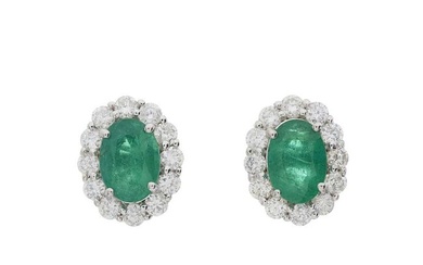 A pair of 18ct gold emerald and diamond cluster stud earrings