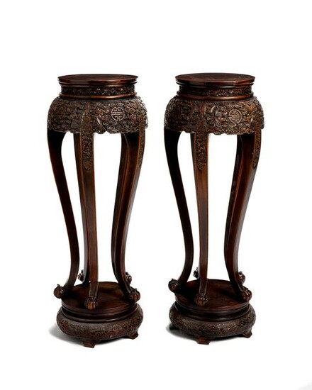 A pair of Chinese carved hardwood stands