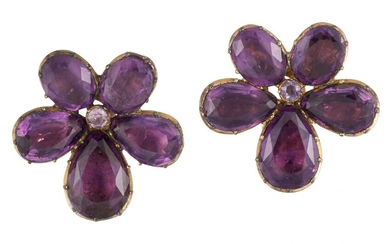 A pair of Georgian gilt metal foiled purple paste earclips,...
