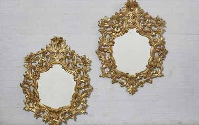 A pair of Italian Baroque style giltwood mirrors