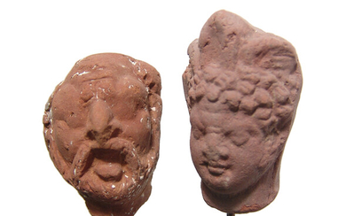 A pair of Romano-Egyptian terracotta heads