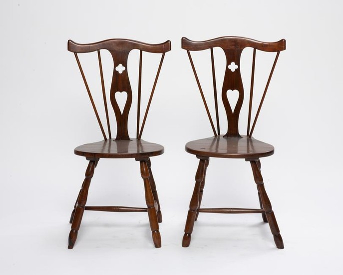 A pair of carved hardwood side chairs