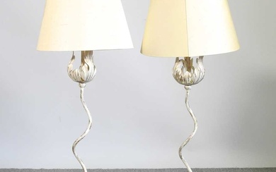 A pair of cream and gilt painted metal table lamps...